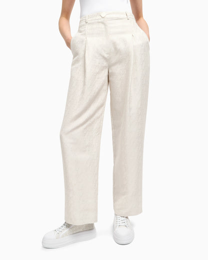 Pleated trousers with allover logo