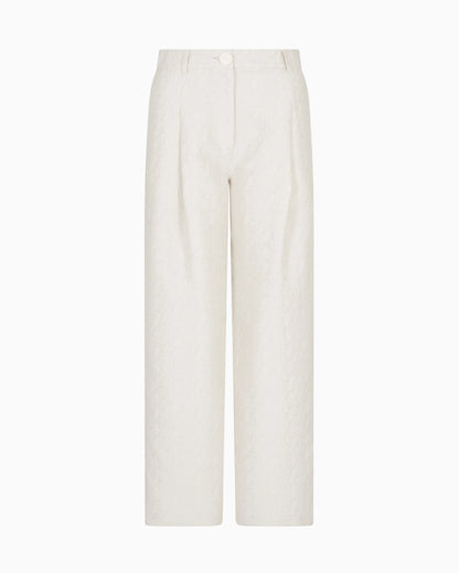 Pleated trousers with allover logo