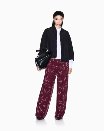 Pleated trousers in chiffon foliage