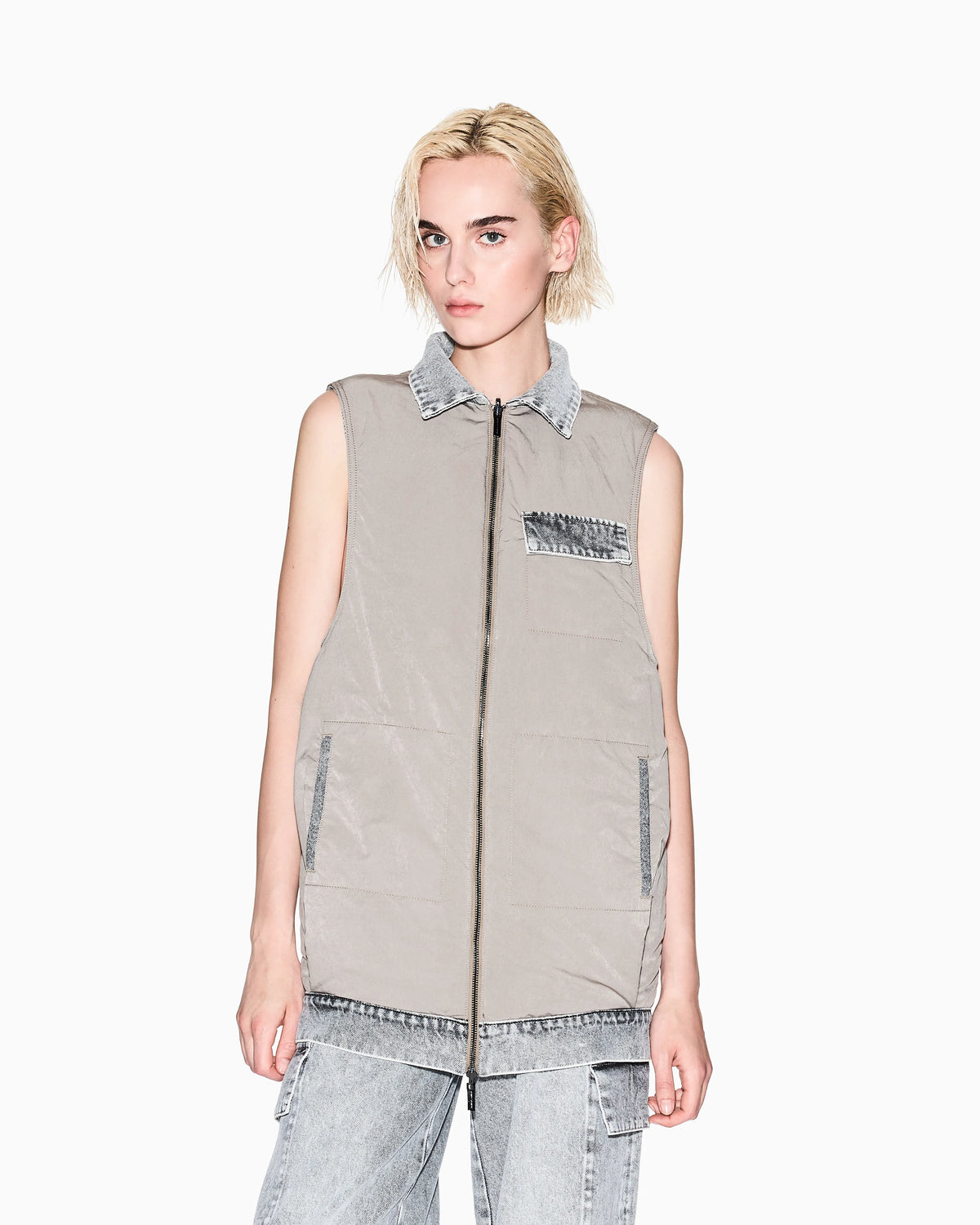 Long vest in stone washed denim
