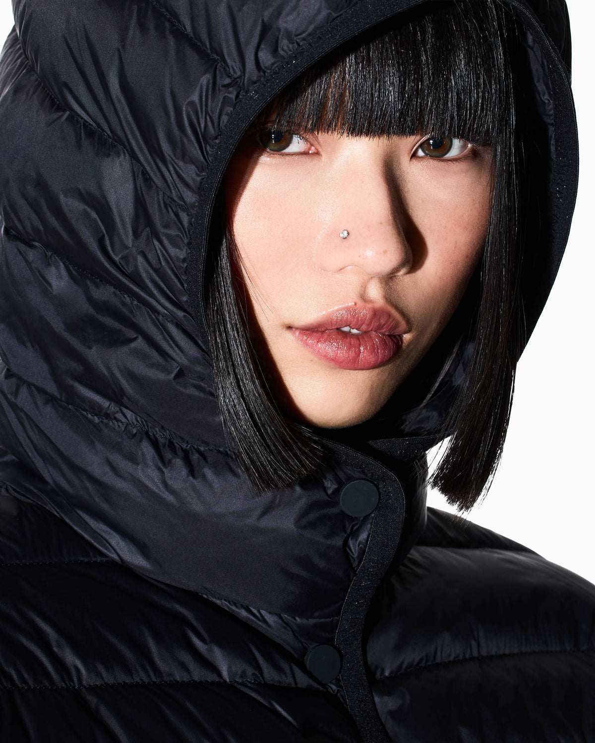 Short down jacket with quilted hood