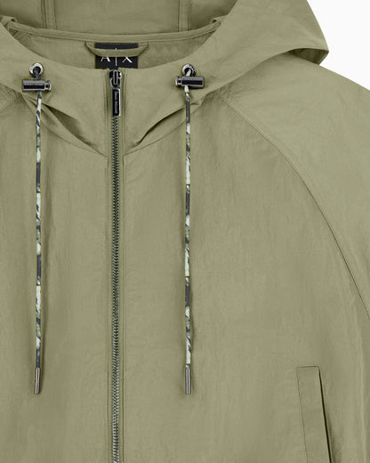 Windbreaker in shiny nylon with metallic effect