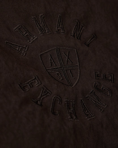 Quilted nylon twill puffer jacket with a high collar