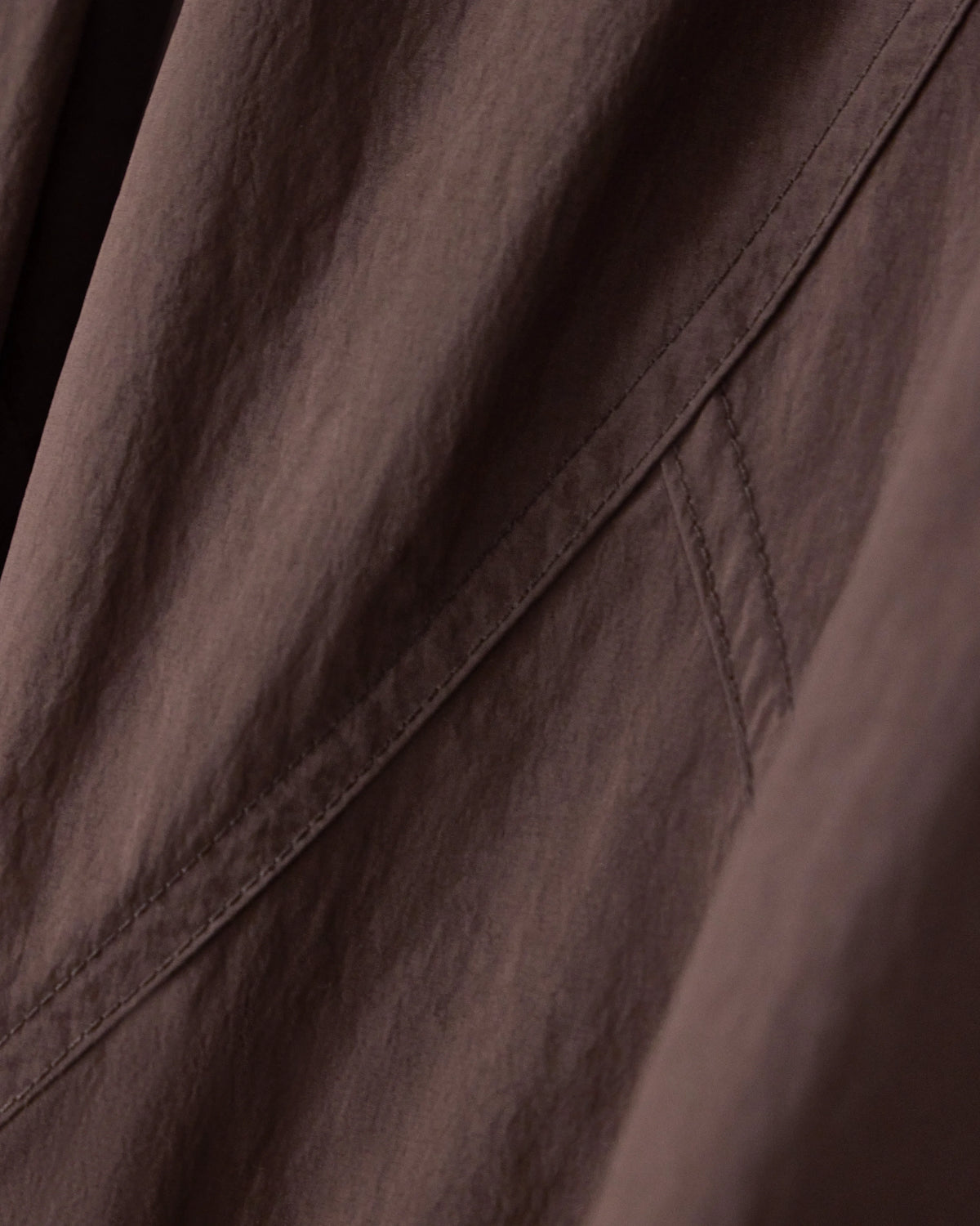 Oversized trousers in crinkle nylon with down padding