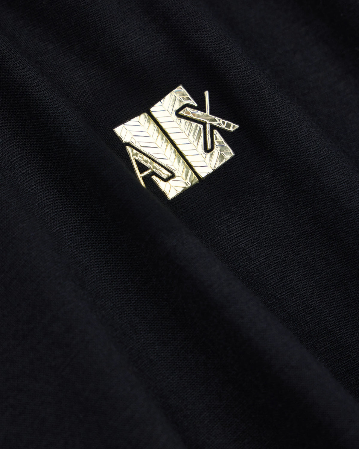 Crew neck T-shirt in viscose jersey with a metallic logo