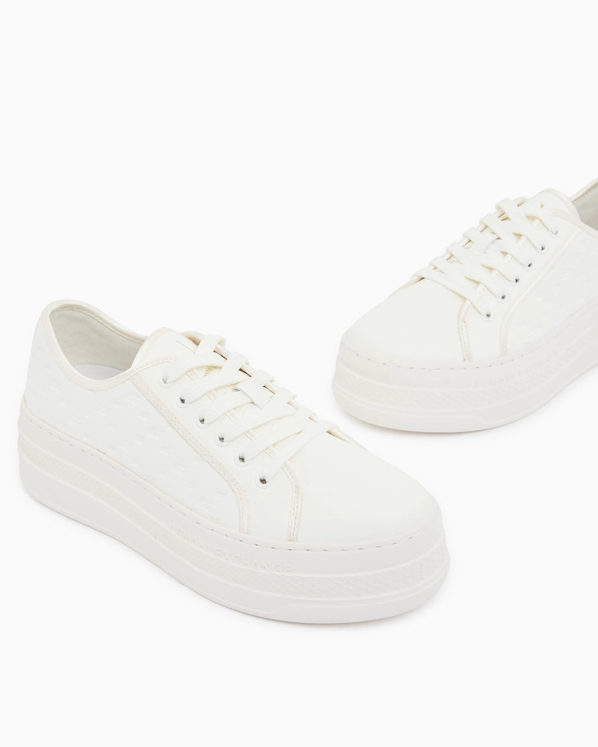 low top Sneakers with all-over debossed logo