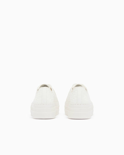 low top Sneakers with all-over debossed logo