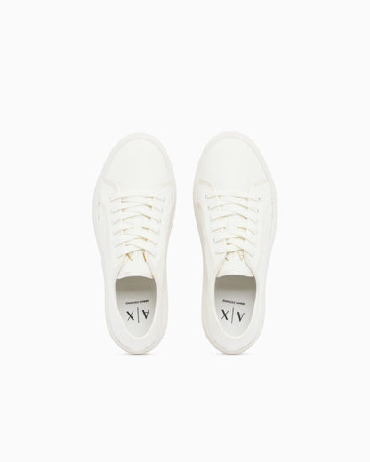low top Sneakers with all-over debossed logo