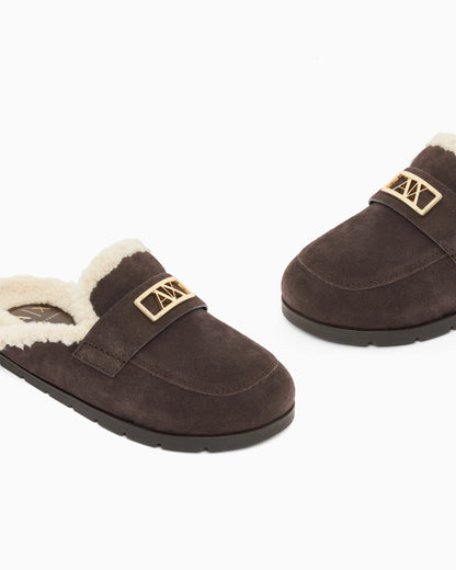 Suede clogs with teddy details