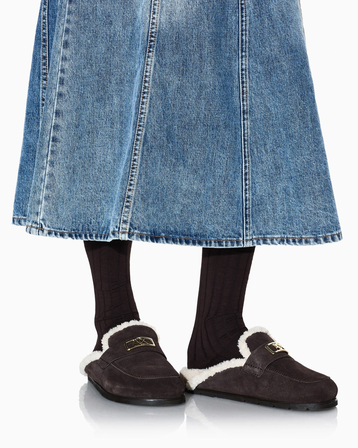 Suede clogs with teddy details