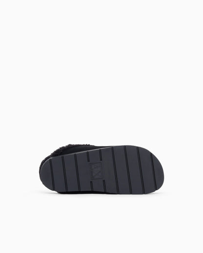 Suede clogs with teddy details