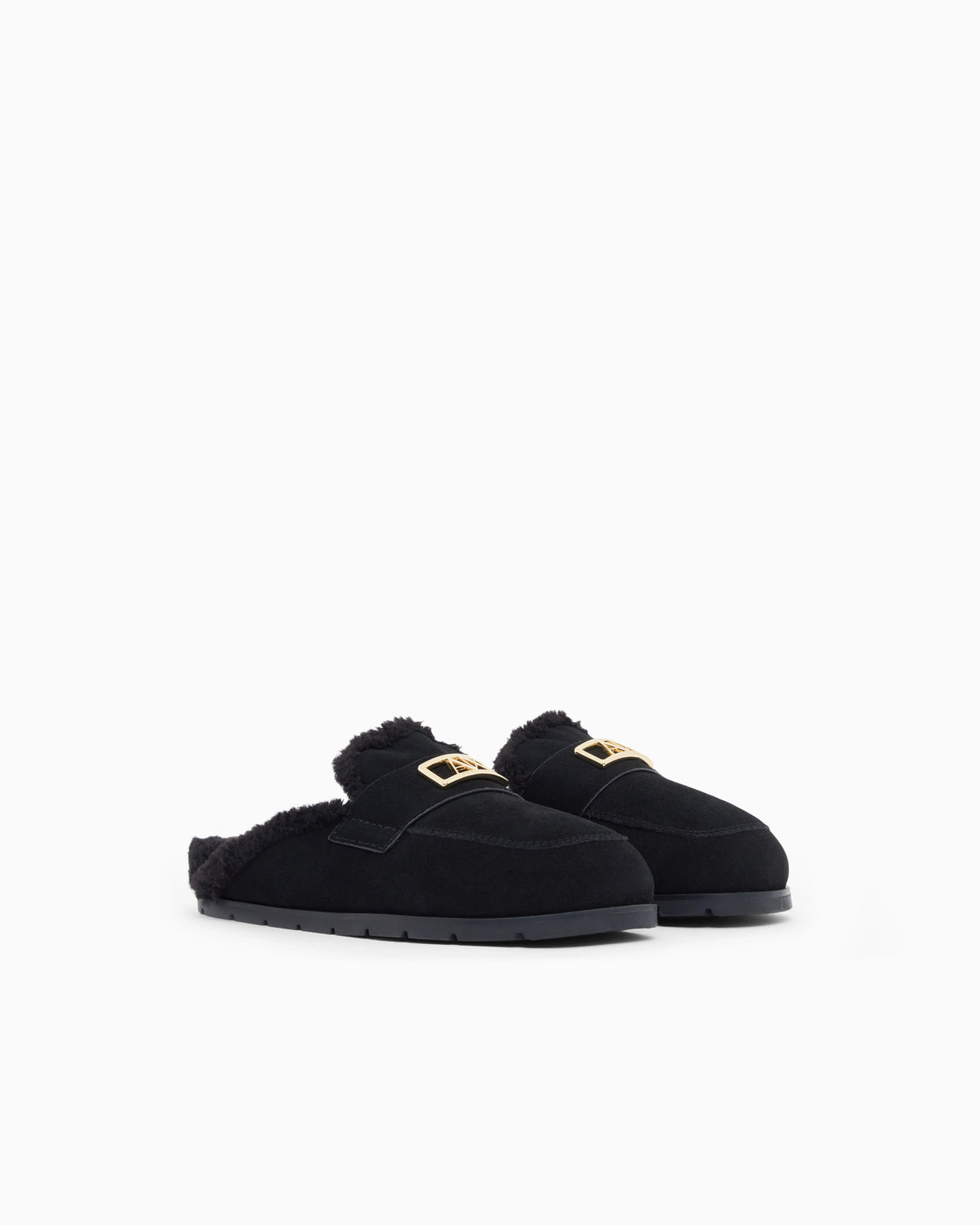 Suede clogs with teddy details