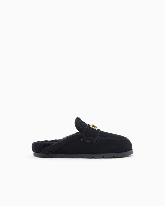 Suede clogs with teddy details