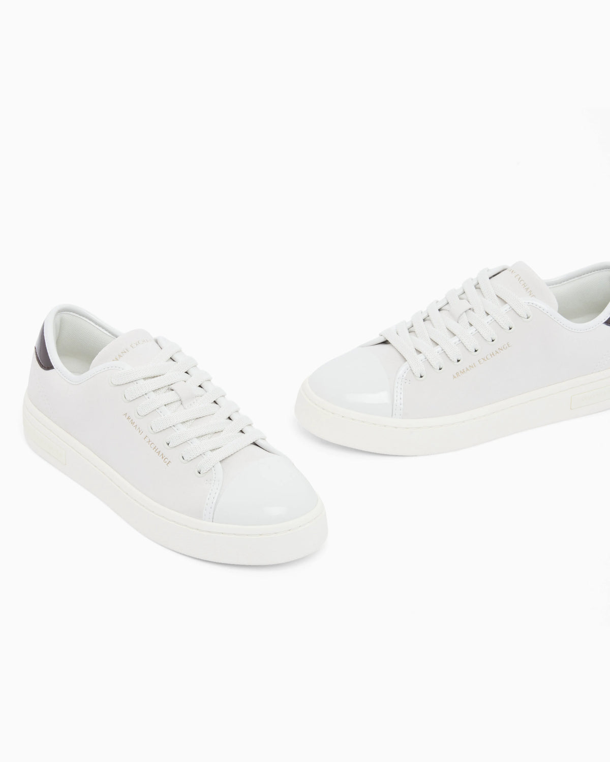Sneakers in suede with patent inserts