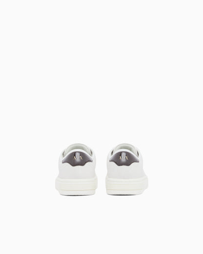 Sneakers in suede with patent inserts