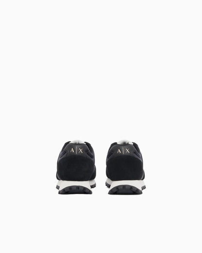 Sneakers with all-over print and suede inserts