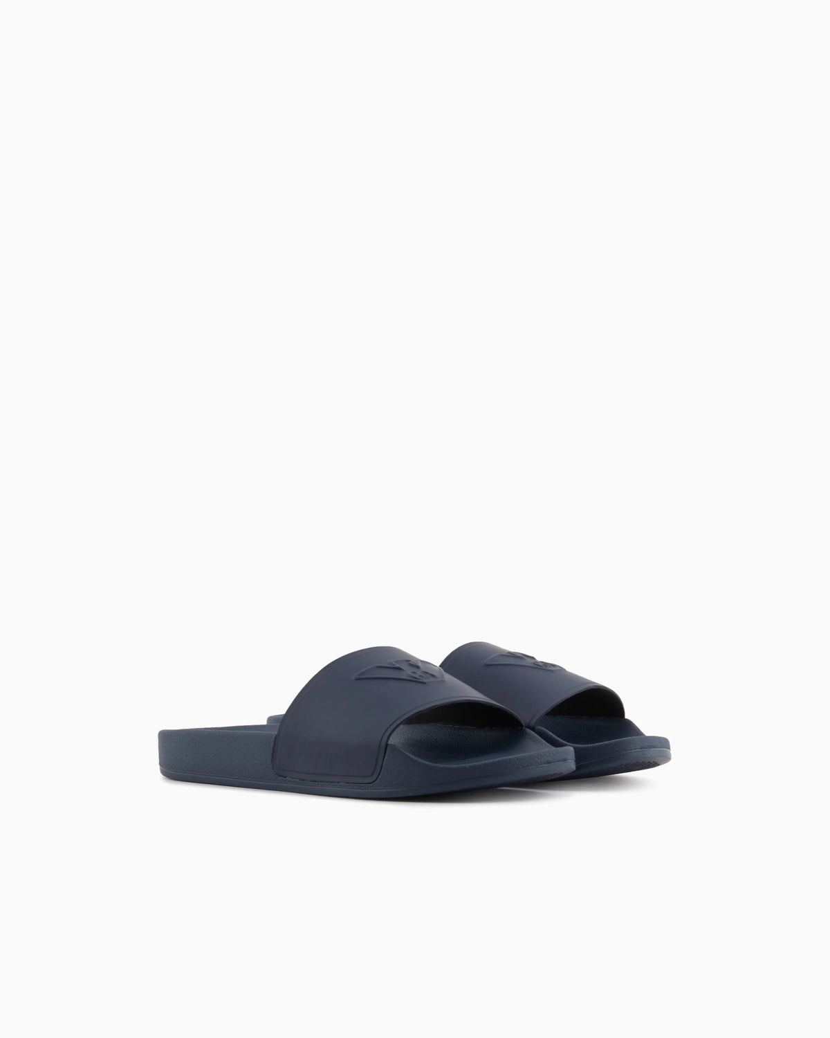 Slides with oversized, embossed logo