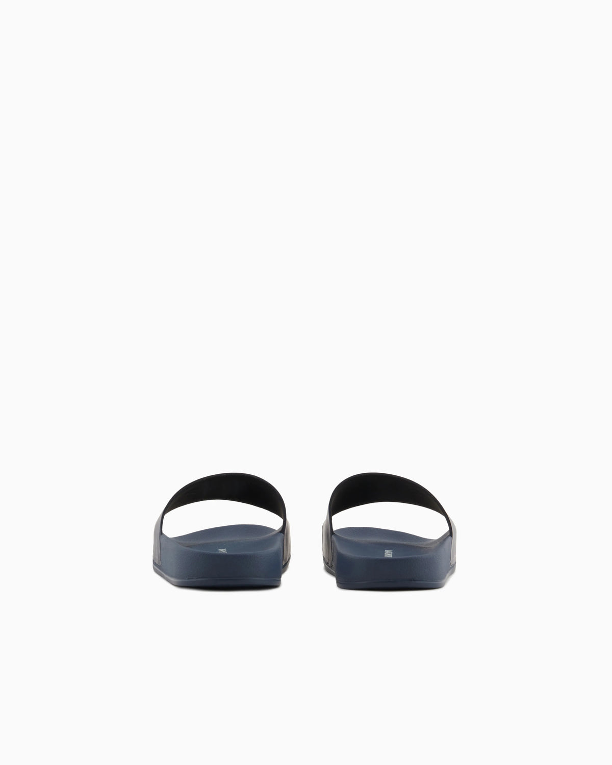 Slides with oversized, embossed logo