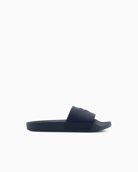 Slides with oversized, embossed logo